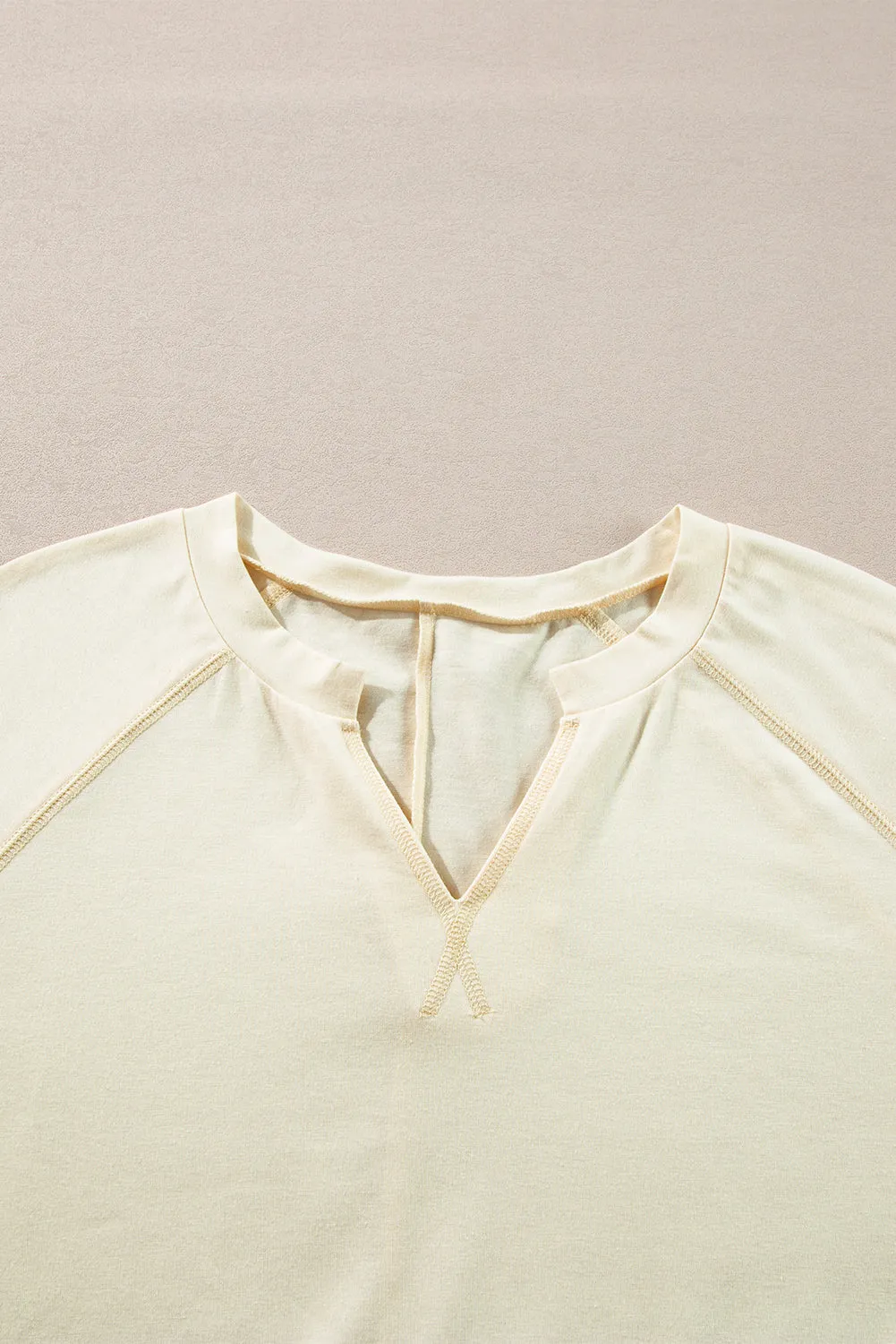 Exposed Stitching Notched Neckline Long Sleeve Top