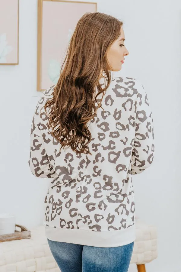 Good Work Pays Off Cheetah Front Wrap Long Sleeve Top in Off White